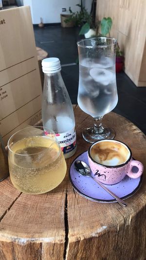 Local kombucha and small macchiato with oat milk  at Život Caffe in Porec