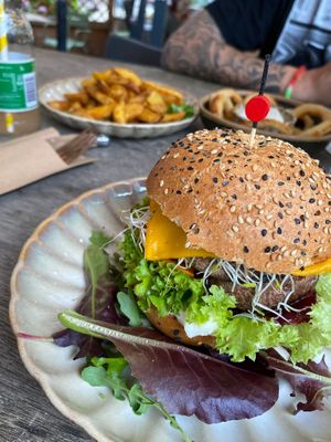 Portabello burger, onion rings, potato wedges. at Copper Branch in Rotterdam