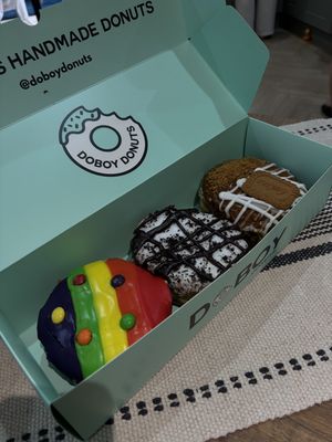 Skittles, cookies & cream & biscoff (all time best)  at Doboy Donuts in Wakefield