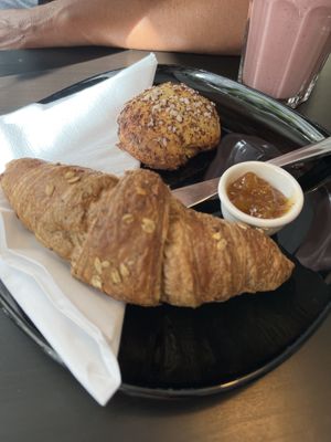 Cinnamon roll, crosaint with jam  at Encanto - Art Cafe in Helsinki