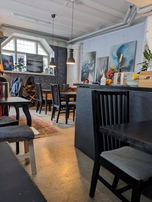 Seating space at Encanto - Art Cafe in Helsinki