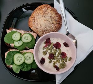 Overnight oats, cinnamon bun and rye bread at Encanto - Art Cafe in Helsinki