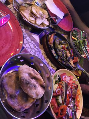 Bread, chips, salads en grilled vegetables   at Tymi in Tirana