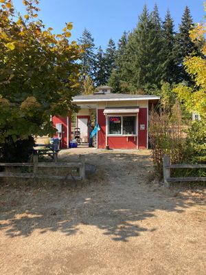 Osm eats, cute little hut with a herb garden behind.  at OSM Eats in Langley