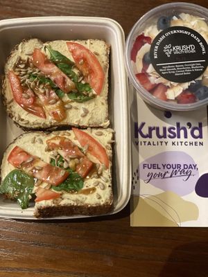 Amazing cheese toast on thick tasty whole grain with spinach tomatoes and truffle oil. Overnight oats with fresh fruit.  at Krush'd Vitality Kitchen in Durant