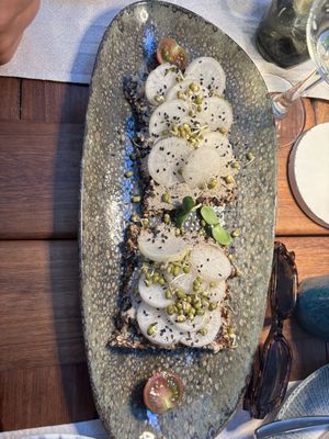 Seed cracker with radishes   at Capo Fronte in Rab