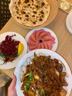 Naan bread, beetroot hummus, fattoush salad, side salad  at Lona Grill House & Juice Bar in Bristol