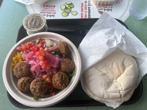 Falafel rice bowl with a side of pita   at Garbanzo Mediterranean Fresh in Fort Collins