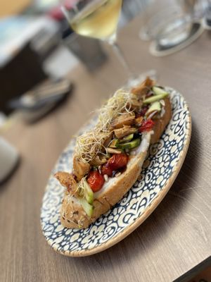 Vegan avocado and chicken toast with cream cheese and other greens.  at 11:11 Bistro Bar Healthy Food in Gran Canaria