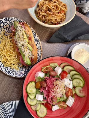 Small portion Spaghetti Bolognese, Mexican Hot Dog and Greek Salad  at 11:11 Bistro Bar Healthy Food in Gran Canaria