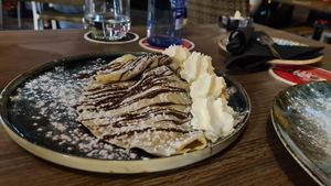 Creppes with strawberries and delicious vegan cream at 11:11 Bistro Bar Healthy Food in Gran Canaria