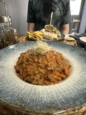 Pasta Bolognese and Tofu Burrito  at 11:11 Bistro Bar Healthy Food in Gran Canaria