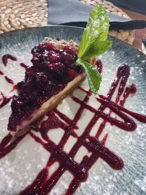 Tarta de queso con frutos rojos at 11:11 Bistro Bar Healthy Food in Gran Canaria