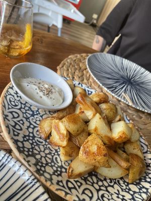 Patas with a garlic mayo sauce   at 11:11 Bistro Bar Healthy Food in Gran Canaria