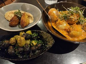 Corn croquettes, olives, papas con mojo at Gärtnerei  in Essen