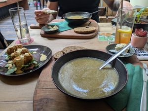 Zucchini/ parsnip soup and "kroket" on toast (left) at Opstand in Nijmegen