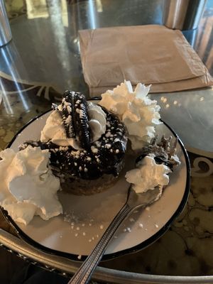 Oreo cheesecake…Guessing made with silken tofu. Not my favorite flavor. Vegan whip was excellent though!  at The Witches Brew in West Hempstead