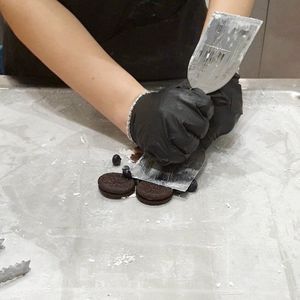 crushing ingredients #Veganuary at Delabuu Ice Cream - KaDeWe - Maybe closed in Berlin