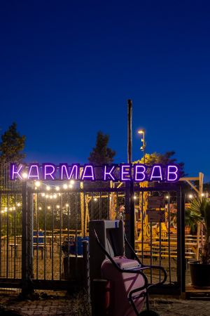 Gate at nighttime at Karma Kebab in Utrecht