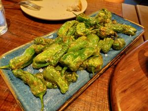 Starters / Padrón peppers, none was 🔥 BTW 👎🏻 at Lamucca de Pez in Madrid