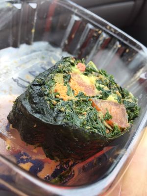 A piece of carrot tuna kale sushi at Tassili's Raw Reality in Atlanta