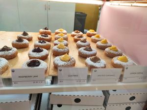 Raspberry Jam, Custard, Salted Caramel (not vegan) and Lemon Creme at Happy Dough in Chermside