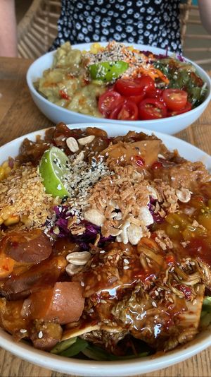 Front: vegan chicken satay. Back: vegan green chicken curry. Both very flavorful with plenty of chicken pieces  at Áro in Kassel