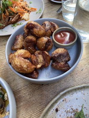 Crispy potatoes - tomato sauce instead of aioli to make it vegan (from specials)   at Karma and Crow in Brooklyn Park