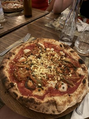 Vegan pizza with eggplant and vegan cheese  at L'Osteria Pizza e Cucina in Canggu