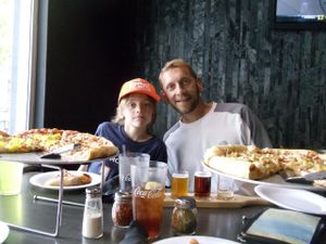 2 vegan pies with Daiya, tempeh, onions, banana peppers and artichoke hearts.  at Mellow Mushroom in Denver