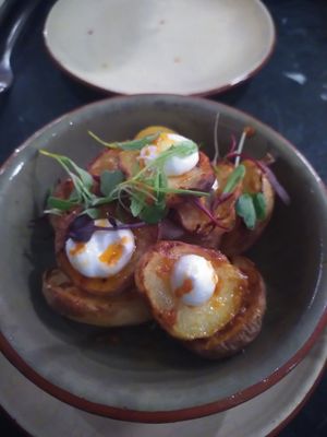 Patatas bravas with incredible garlic mousse at Velada in Barcelona