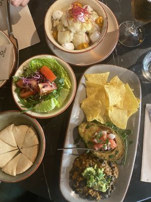 Baked avocado with beans and cauliflower with super tasty sauce  at Velada in Barcelona