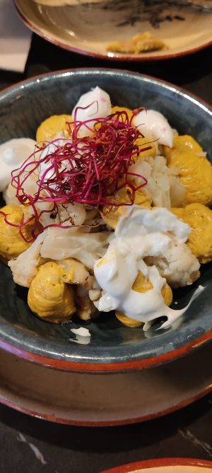 Cauliflower with tika masala and garlic sauces at Velada in Barcelona