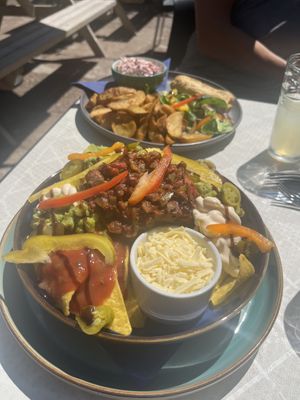 Vegan nachos and vegan sausage roll meal  at The Tile Press Cafe in Telford