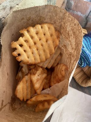 Very generous portion of waffle fries!  at Soy Boys in Toronto