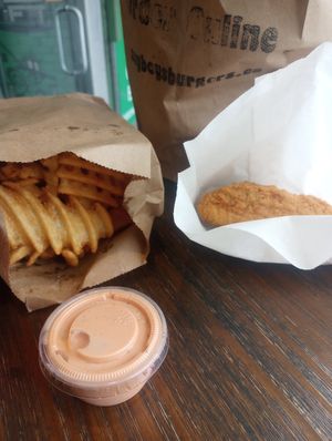 House sauce ,chicken tenders, and a massive amount of waffle fries. You may want to get two sauces :) at Soy Boys in Toronto