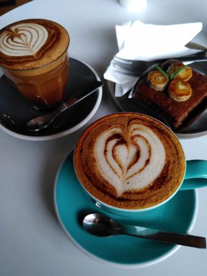 amazing cappuchino and mocha with pistachio milk! cake was not vegan at Ma Chill Coffee in Chiang Mai