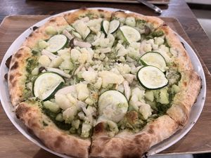 Basil sauce pizza with potatoes, zucchini, and shimeji and eringi mushrooms  at Pizza Cucinova in Tokyo