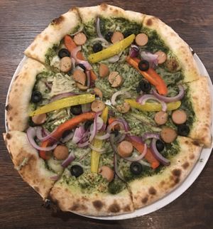 Vegan labelled pizza with Daiya cheese and Zero Meat sausage.  at Pizza Cucinova in Tokyo