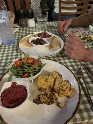 Cauliflower Steak with beetroot hummus  at Raphael's Restaurant in Ayia Napa