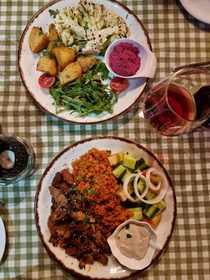 Afelia &  Cauliflower steak at Raphael's Restaurant in Ayia Napa