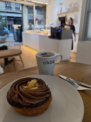 Cronut with chocolate topping and Americano at Chök - Valencia in Valencia