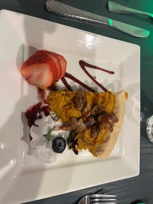 Pumpkin pecan pie with a little whipped cream  at V-Spot in New Hope