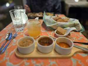 Soup flight, bread basket, peach mocktailI at V-Spot in New Hope