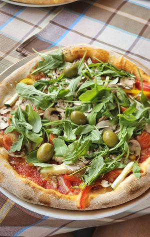 Pizza "Classic"       Vegan cheese, tomato sauce, mushrooms, cherry tomatoes, arugula, corn, olives, zucchini, red and yellow paprika at Papillon Restaurant & Pizzeria in Pula