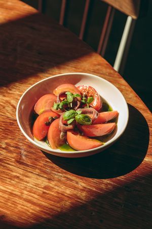 Marmande tomato salad with pedro ximenez pickled capers and basil oil (VG)  (addition of anchovies is optional) at Canto in Manchester