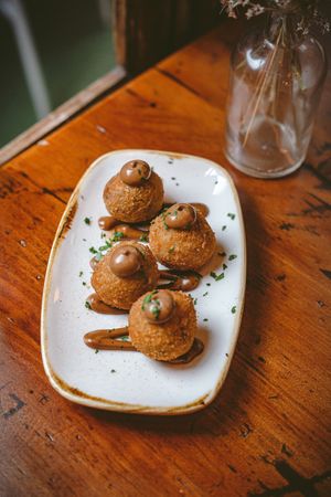 Mushroom croquetas with black garlic mayo (VG) at Canto in Manchester