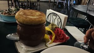 Beans in a pot with corn bread  at Tannini - Tanini 14 in Tbilisi