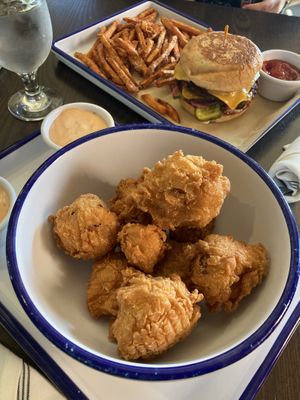 Impossible burger with vegan cheese and vegan chicken fried cauliflower    at Northland Gastropub at Landmark Inn in Marquette
