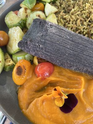 Blue corn & bean tamale with roasted veggies and rice  at Wahpepah's Kitchen in Oakland